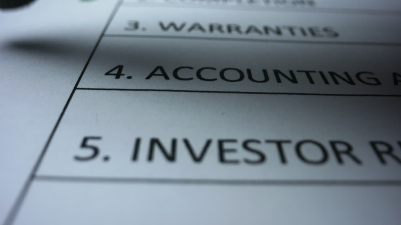 Business person filling up to do list. Marker writing check marks in document
