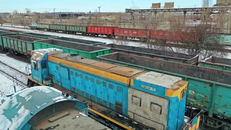 container freight train on station. station with freight trains and containers in aerial view