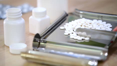 medicine tablets on counting tray with counting spatula