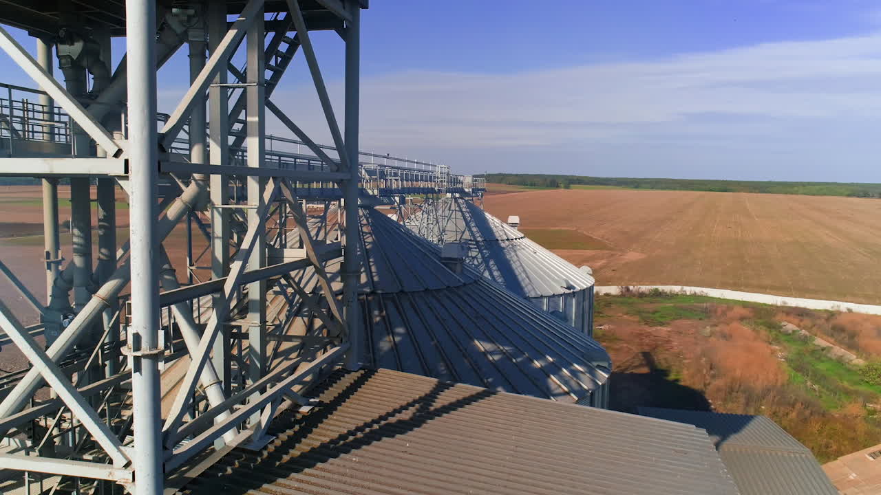 Farming elevator and granary. Storage of grain and other different cereals. Aerial view