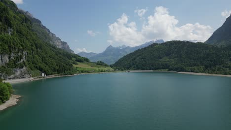 Aerial-shot-of-Klöntalersee-great-lake,-Glarus-Canton,-Switzerland