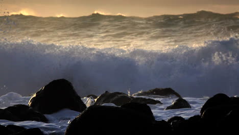 windswept waves roll into a beach following a big storm 2