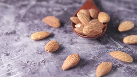 almonds on a wooden spoon