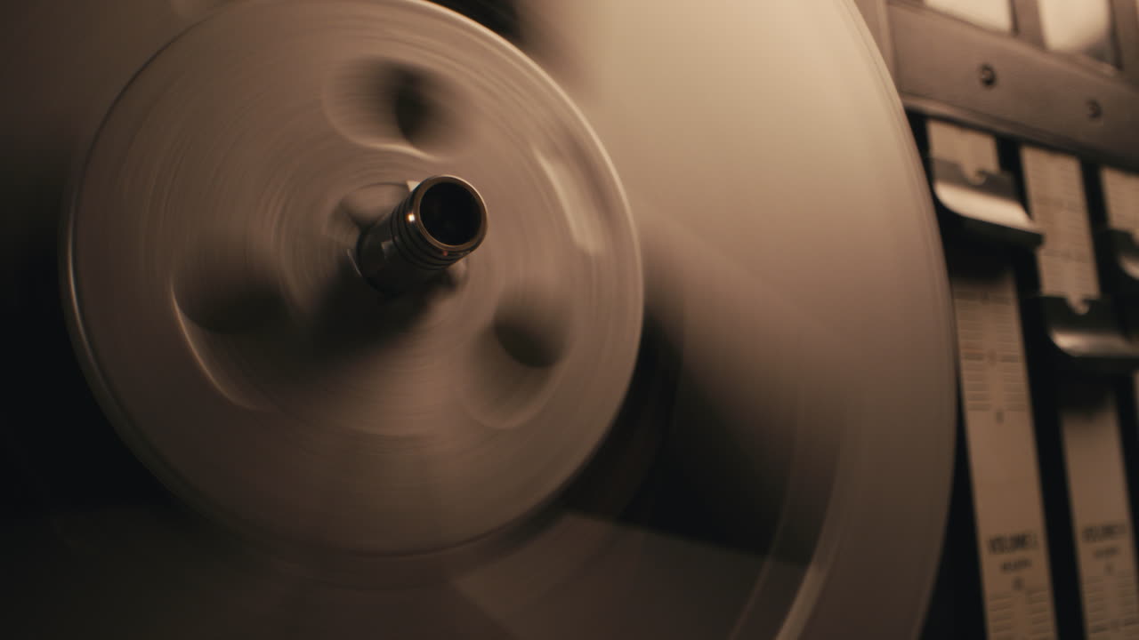 A vintage tape recorder in a blinking light