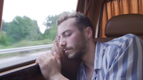 sleeping on a car trip.