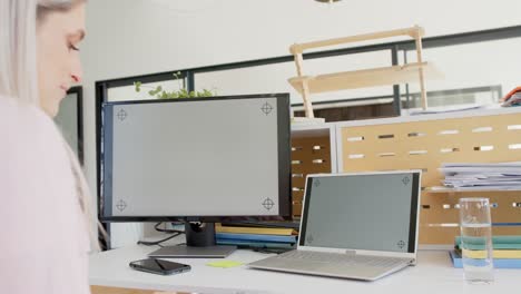 happy caucasian businesswoman having laptop video call with copy space in slow motion