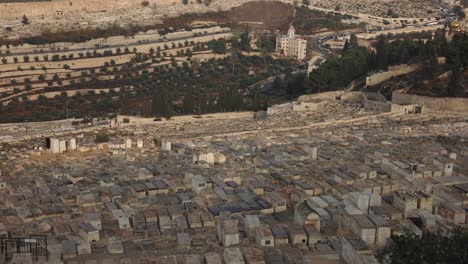 aerial drone footage of the city around the dome of the rock in israel