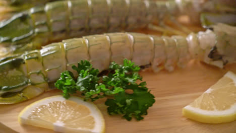 fresh-mantis-shrimp-with-lemon-on-wood-board