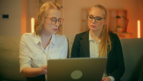 close up of two women talking during business meeting
