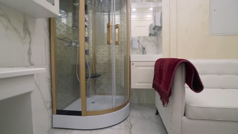 luxury modern bathroom with spa shower and relaxing seating