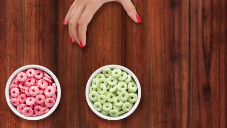 offering bowls with multicolored breakfast cereal rings