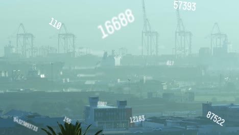 animation of multiple changing numbers against aerial view of cityscape