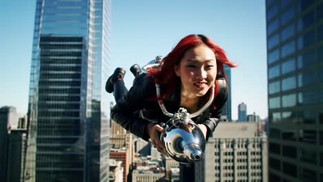 woman flying a jetpack over a city