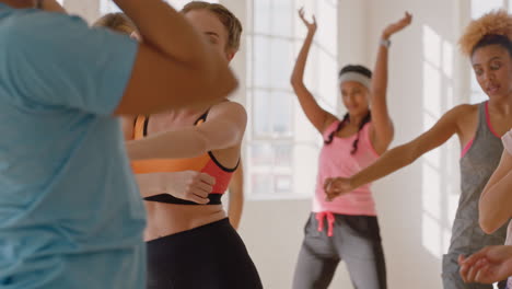 dance class group of multiracial people dancing practicing choreography moves training in fitness studio enjoying healthy active lifestyle