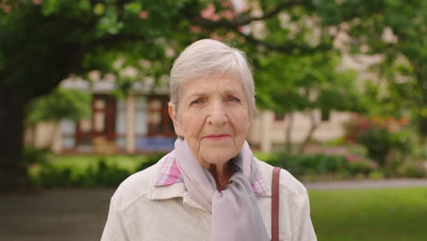 portrait of an elderly woman in nature standing