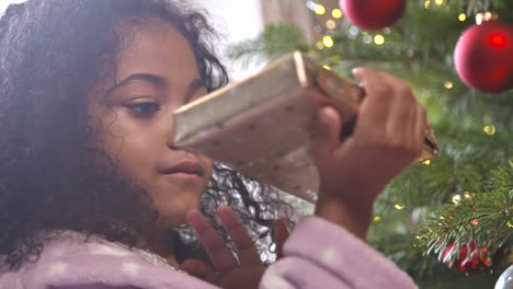 curious child examining present