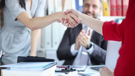 businesswoman partners shaking hands in office at business meeting 4k movie slow motion