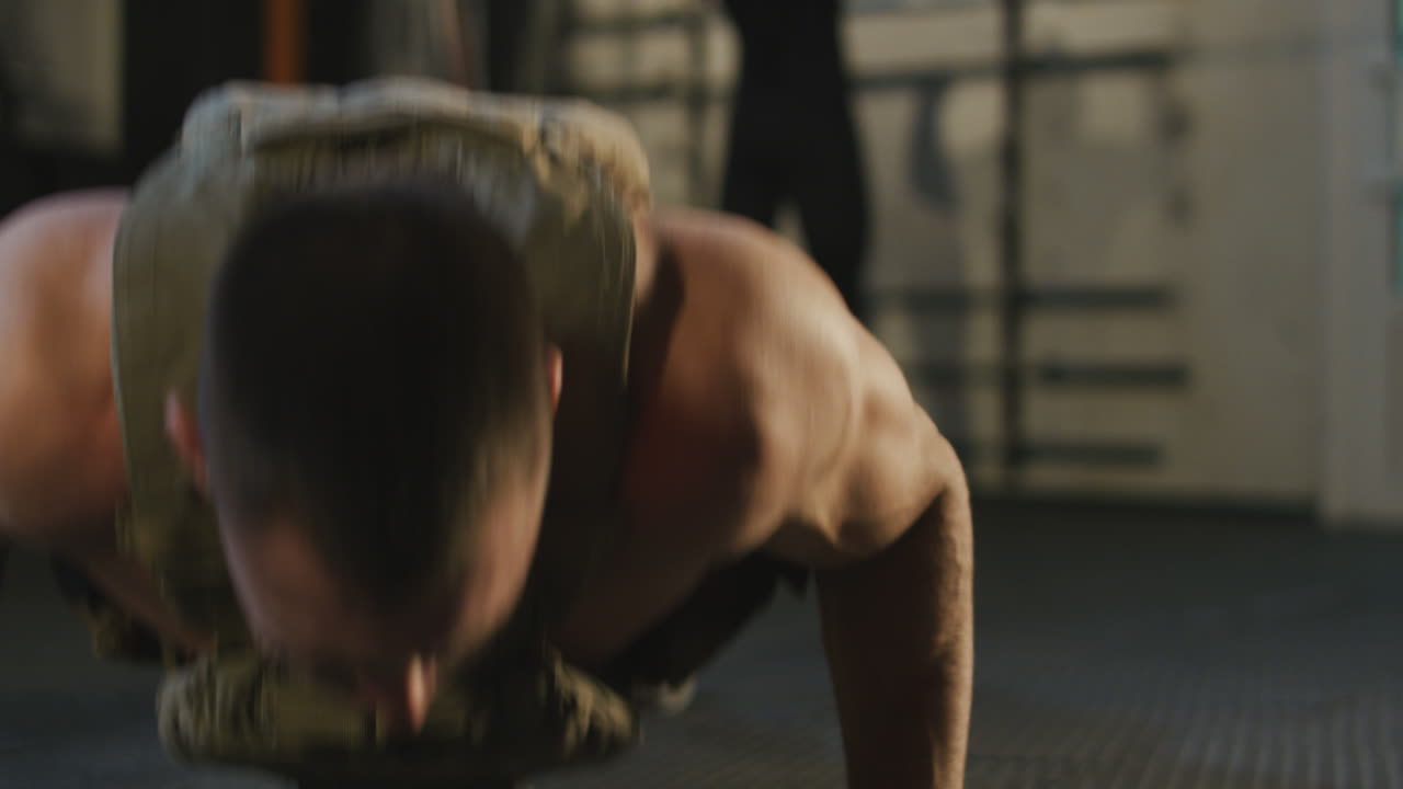 Tired Sportsman Doing Push Ups At Gym. Young Fighter Making Exercises In Sport Club. Progressive ... (Stock Footage)