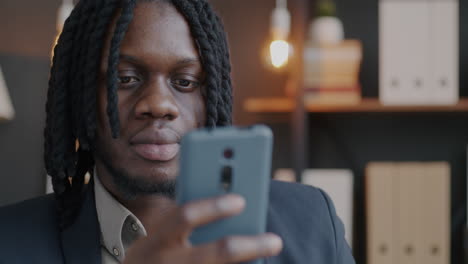 man using smartphone and credit card