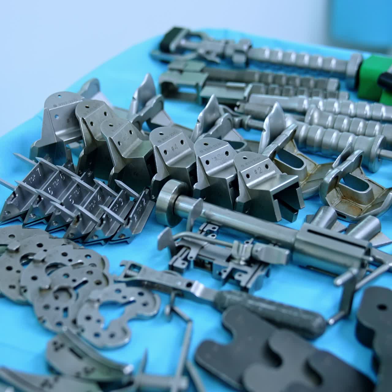 Metal inventory used in orthopedic surgery. Close up view on the surgical stand with an array of tools and devices