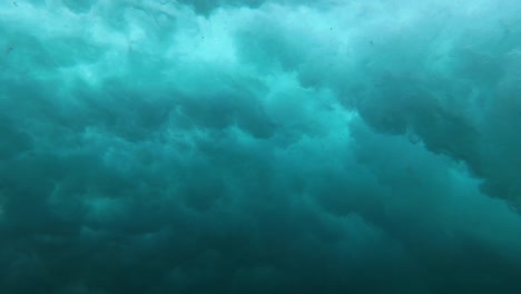 underwater view of waves over the surface