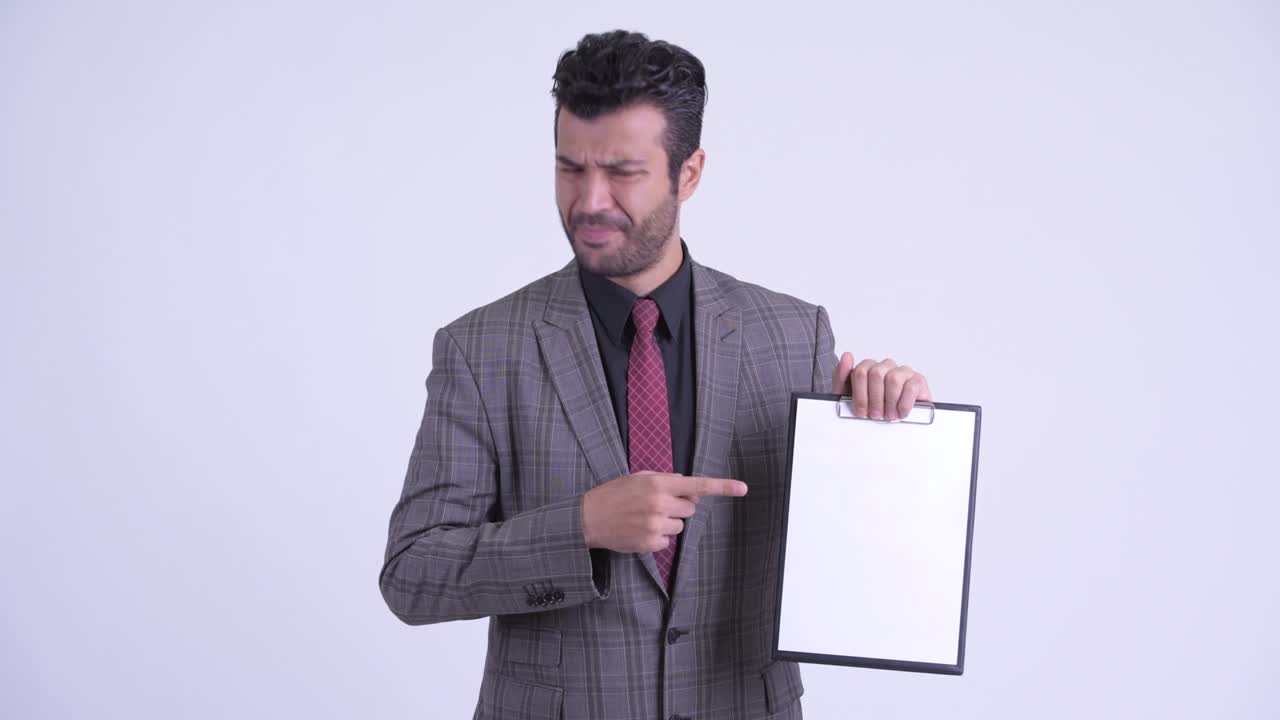 Handsome bearded Persian businessman in suit