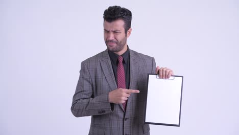 handsome bearded persian businessman in suit