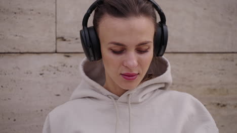 woman listening to music outdoors