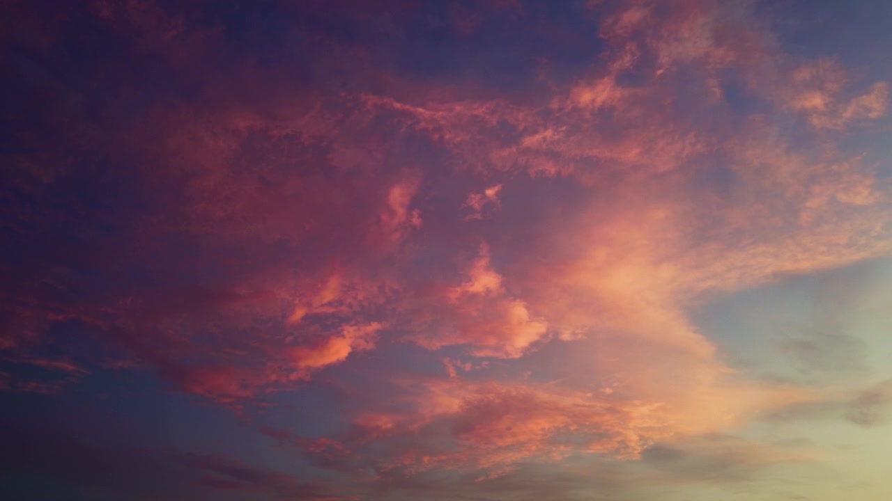 Dusky Cloudscape Fills The Sky With Layered Clouds During The Evening Twilight. Low-angle Shot