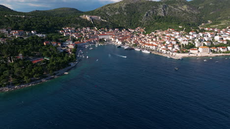 Hvar Town And Port By The Adriatic Sea In Hvar Island, Croatia. - aerial shot
