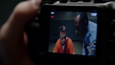 police interrogation being recorded on camera