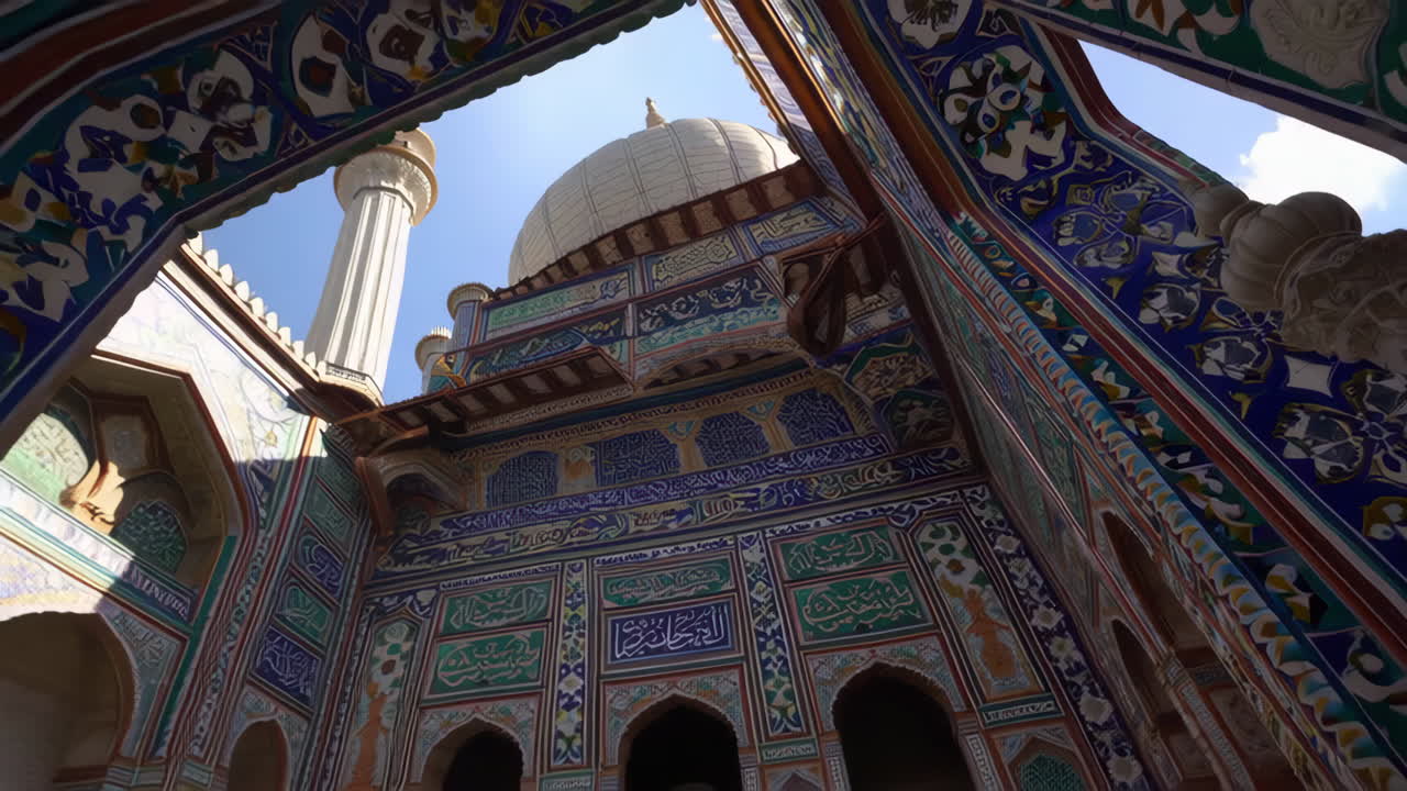Close-up of Ornate Islamic Architecture with Colorful Tilework and Arabic Calligraphy