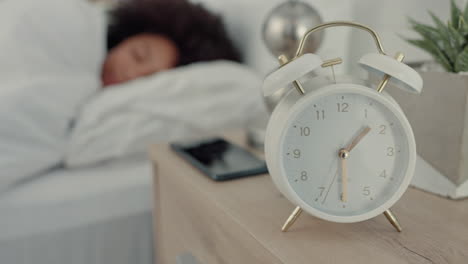 alarm, clock and woman in bed sleeping