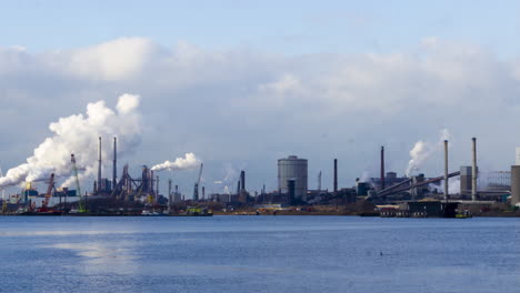 Time-lapse-of-polluting-industrial-area-near-harbor---zoom-in