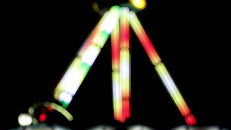 Fahrgeschäft-Im-Vergnügungspark-Bei-Nacht,-Bokeh,-Statisch