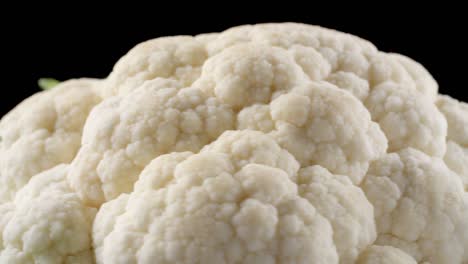 closeup video of rotating cauliflower on black background