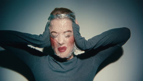 Woman with Plastic Bag Over Her Head