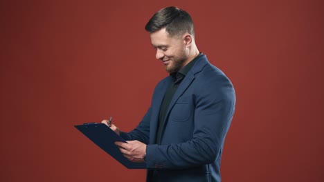 man wearing in formal clothes. young elegant businessman standing on background