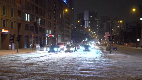 snowy streets in berlin during cold winter evening in the city