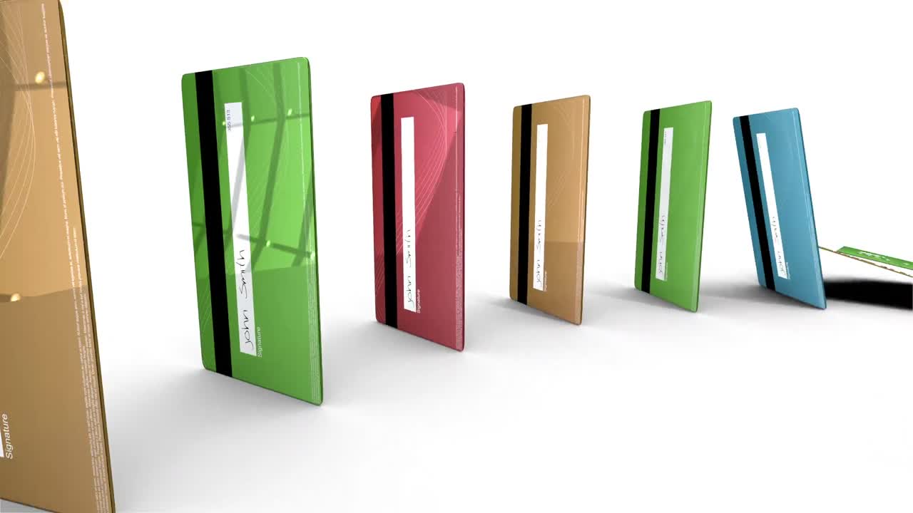 Coloured credit cards falling in a circle like dominoes