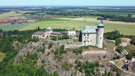 castle at the kuneticka hora hill - museum in raby, czech republic. - aerial shot
