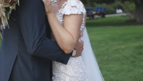 Bride-and-groom-stand-happily-together