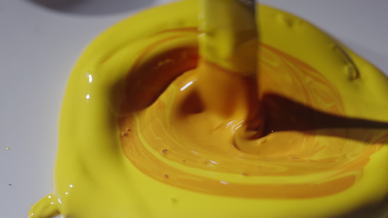 Mixing Yellow Paint on a Palette