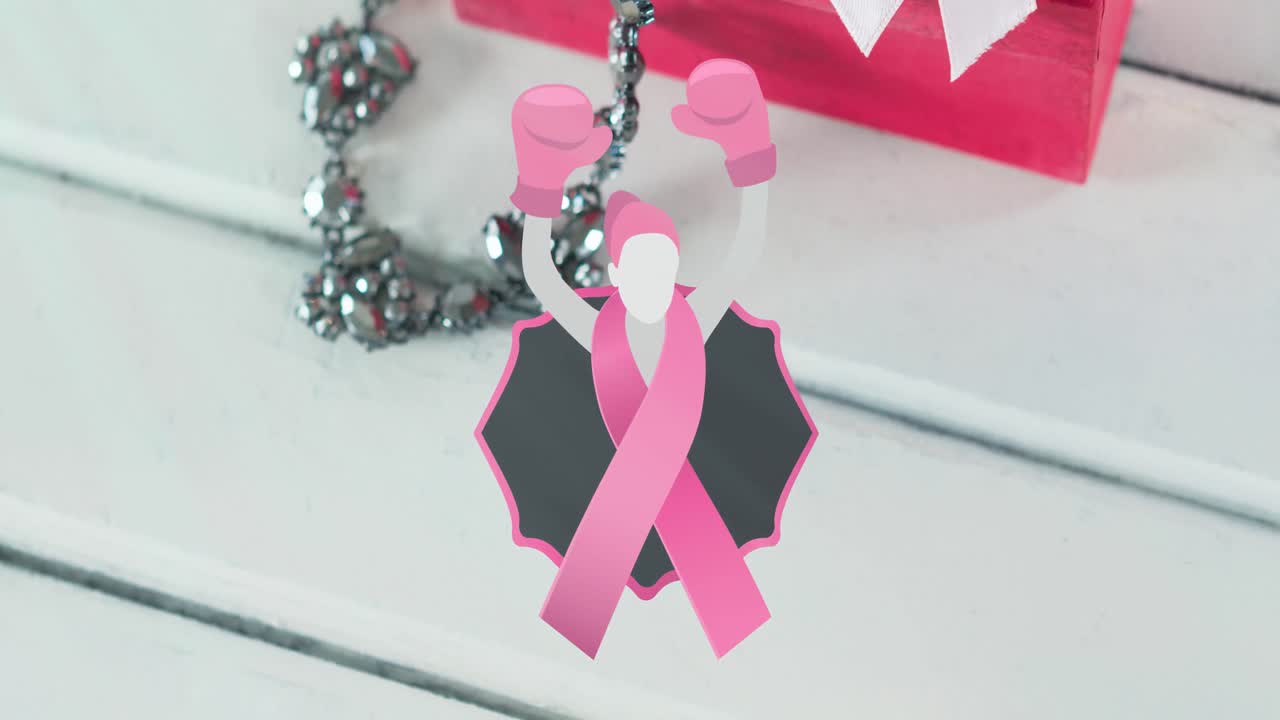 анимация вомы в боксерских перчатках иконка над розовой коробкой и лентой на белом деревянном фоне