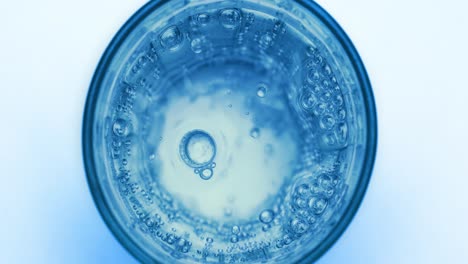 oxygen bubbles in water on a blue abstract background