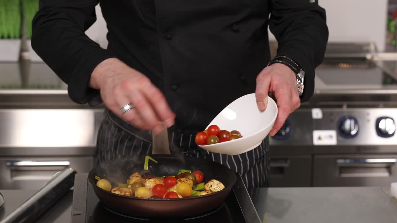 Chef Cooking with Tomatoes and Other Ingredients
