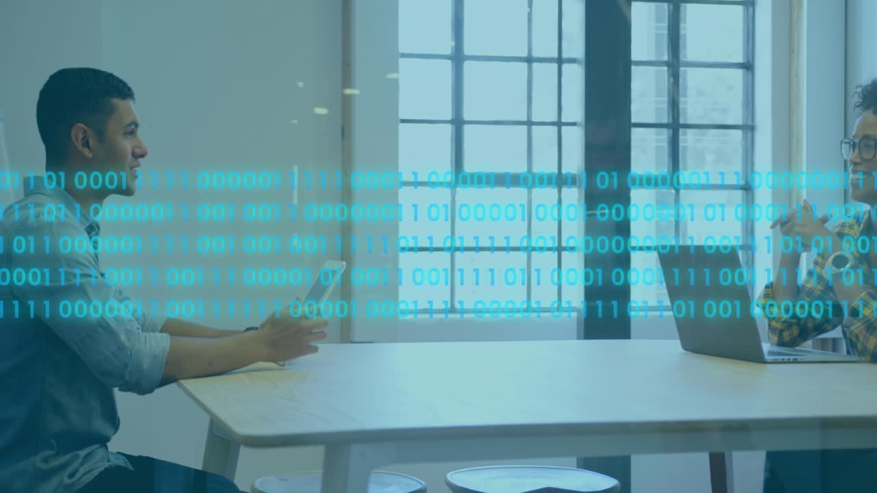 Animation of binary codes over diverse coworkers discussing while using laptop and digital tablet