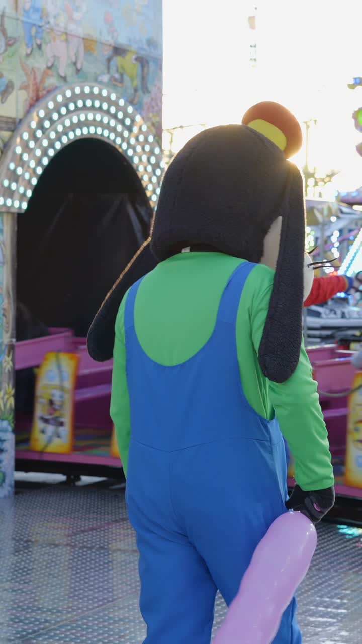 Goofy-like Character at an Amusement Park