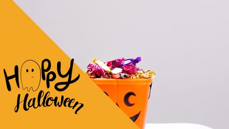 animación de texto feliz de halloween sobre dulces