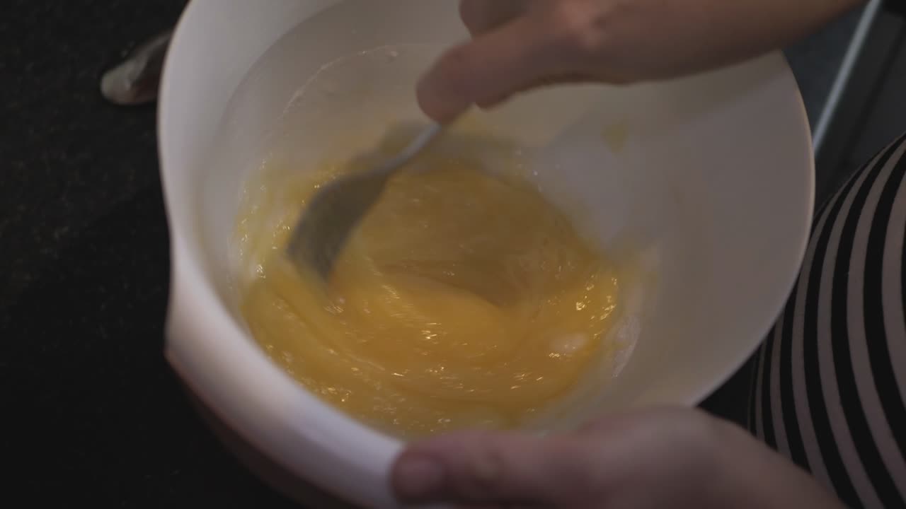 Mix the Eggs and Sugar in the Bowl with a Fork